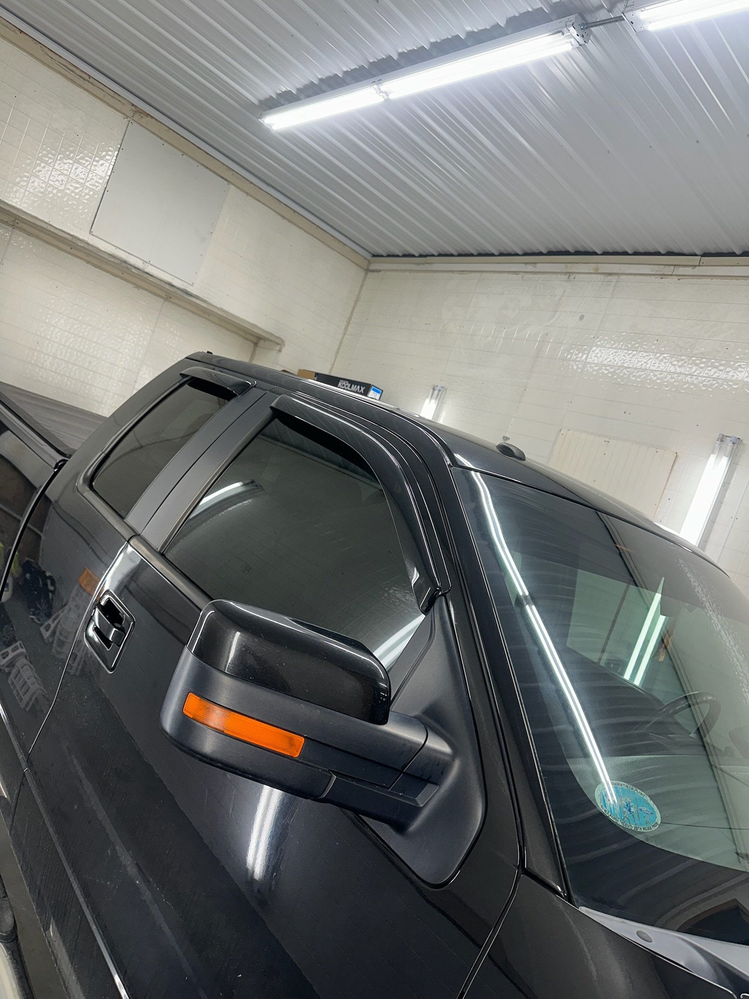 Ceramic window tint closeup precision edge — Garage 717 PA