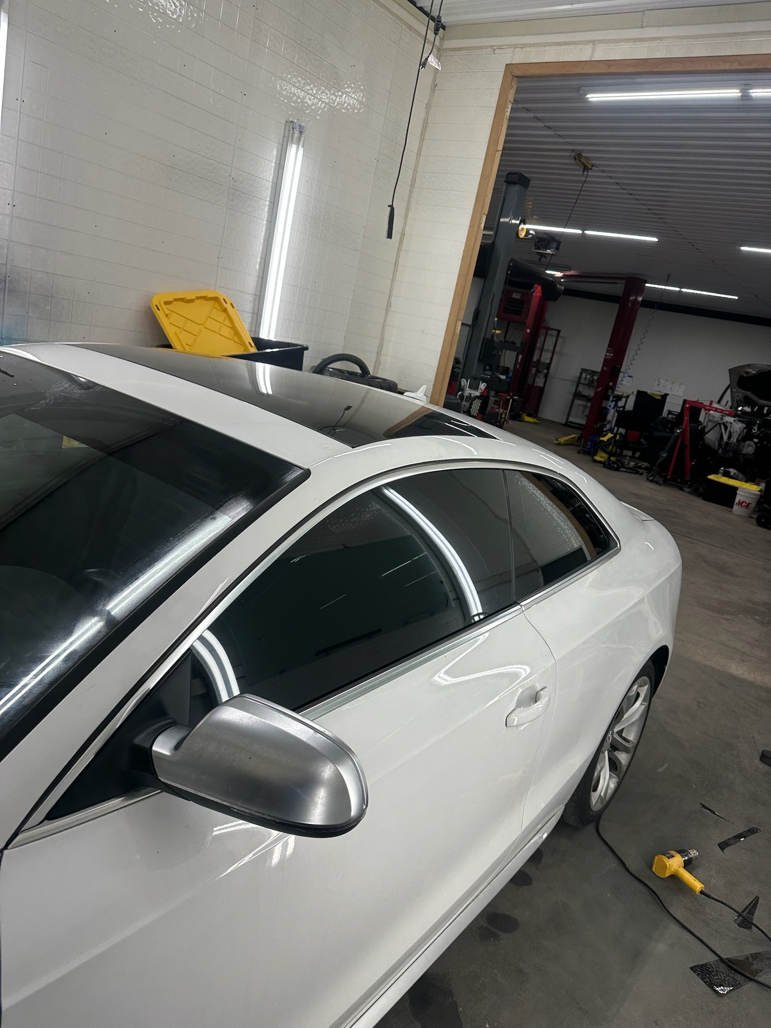 Panoramic roof tint install overhead view — Garage 717 PA